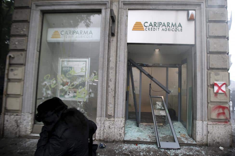Bank Cariparma is seen destroyed by protesters during a rally against Expo 2015 in Milan