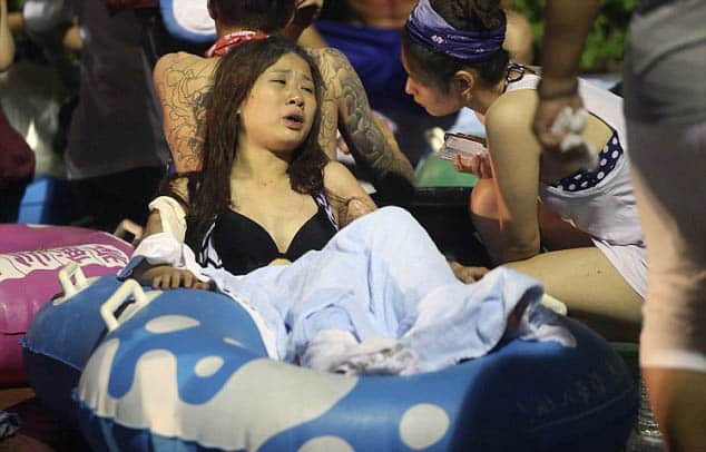 2A09069000000578-3141668-Injured_Victims_were_carried_out_on_inflatables_at_the_water_par-a-227_1435452597054
