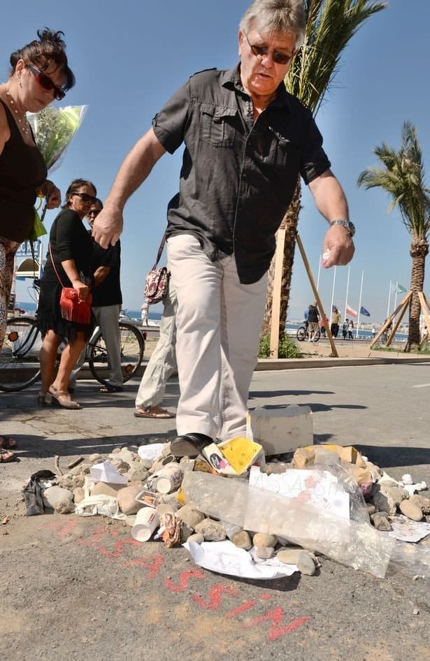 people-spit-and-kick-a-pile-of-rubbish-and-stones